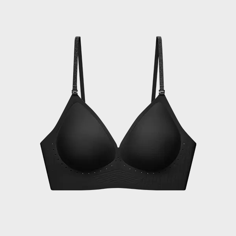 Model wearing the seamless low-back multiway bra with a low back finish